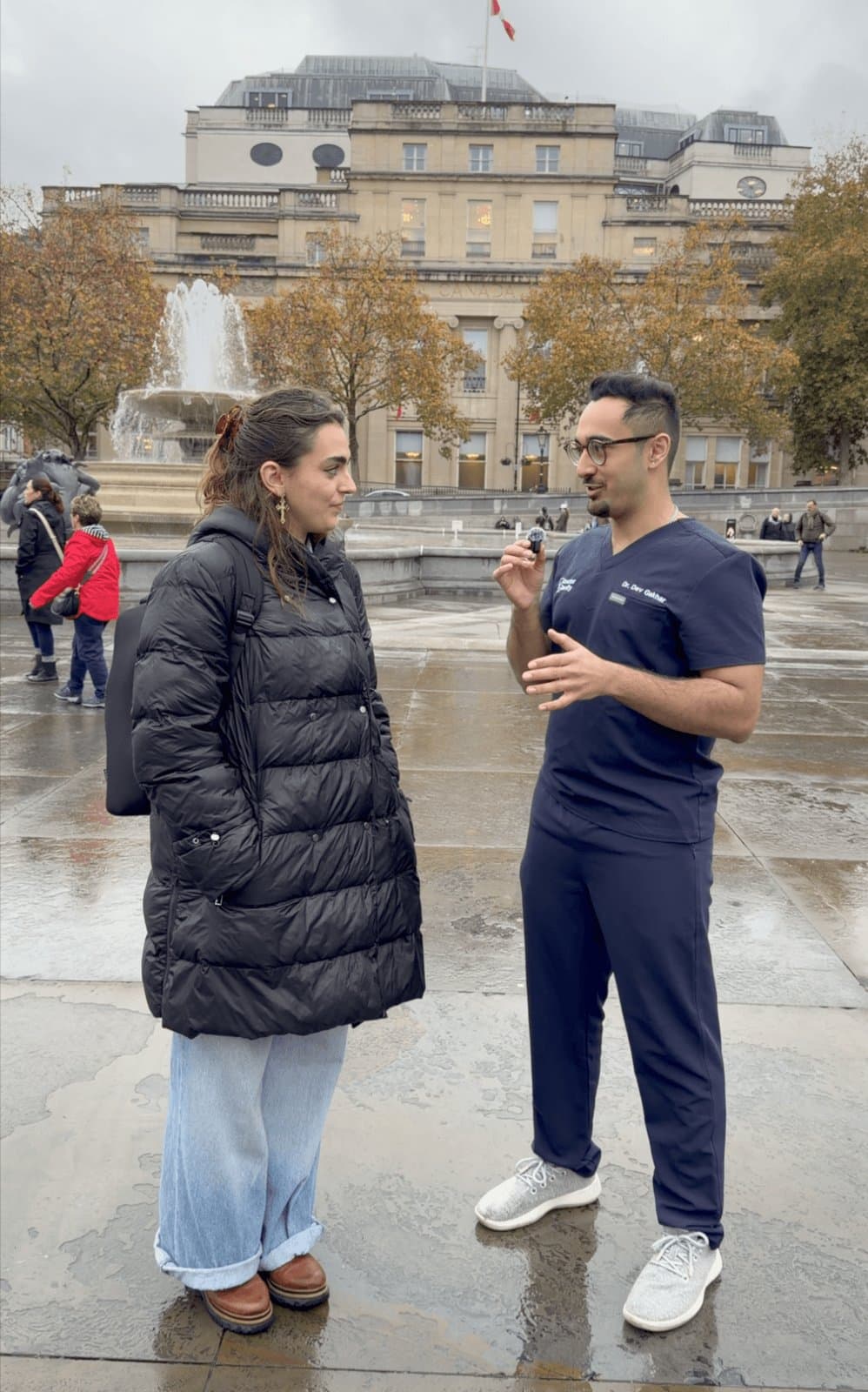 Dr Dev Gakhar interviewing a member of the public in Trafalgar Square