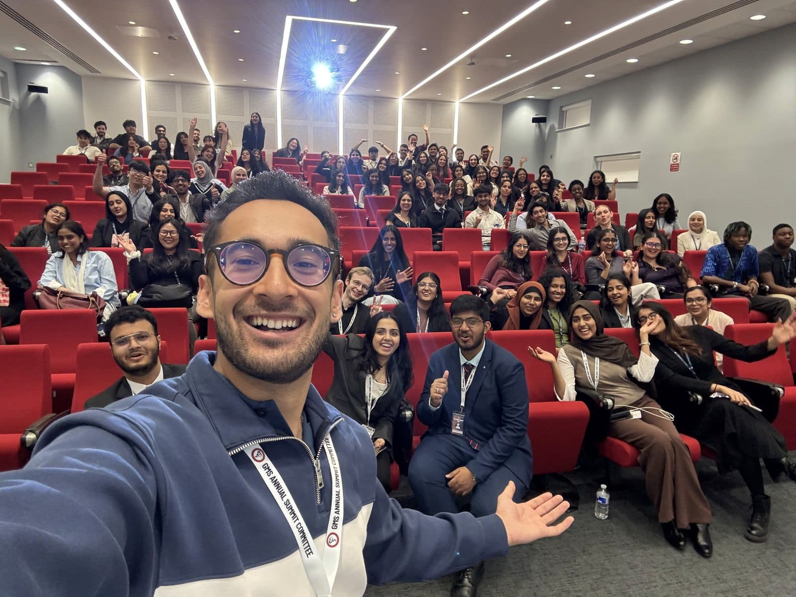 Dr Dev with a lecture theatre of medical students at the University of Buckingham